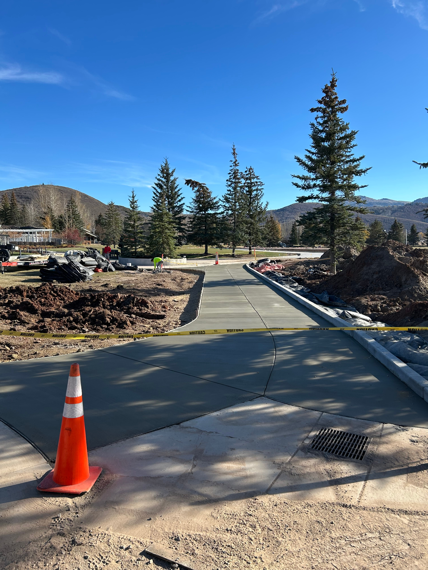 Curved concrete walkway in Park City with mountain views