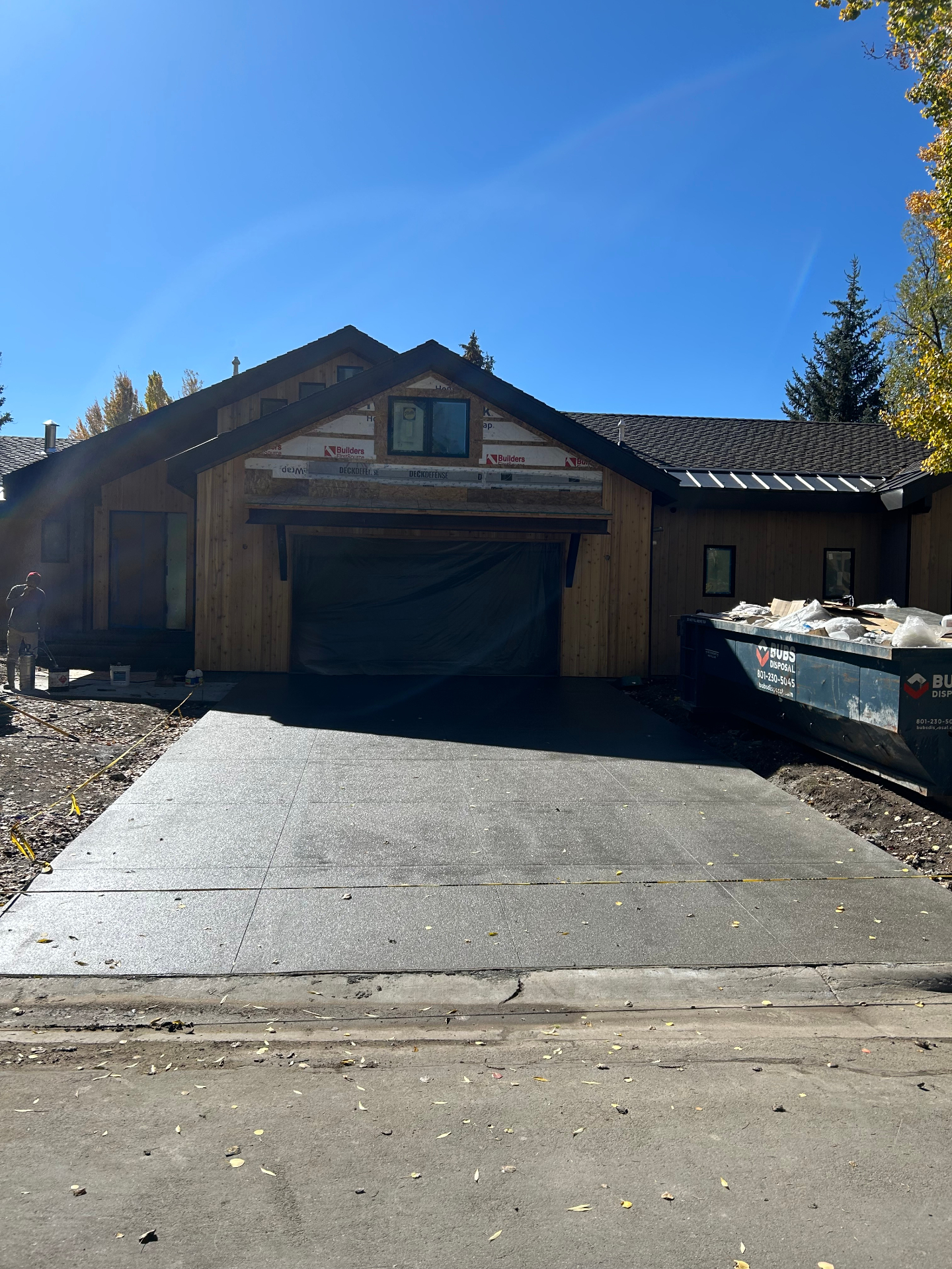 Exposed aggregate concrete driveway at Utah custom home