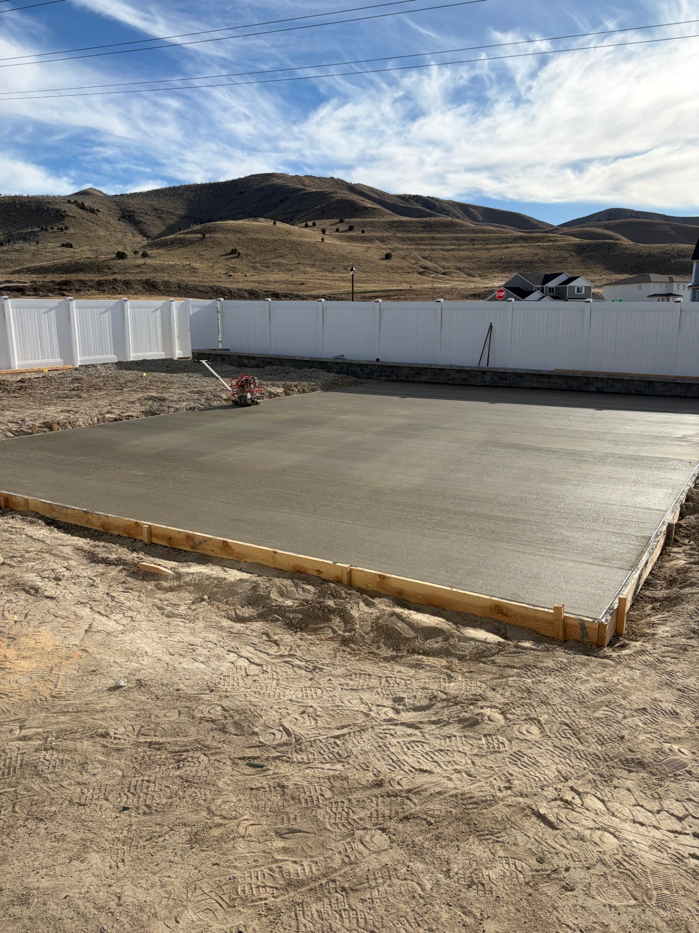 Large finished concrete pad with mountain views